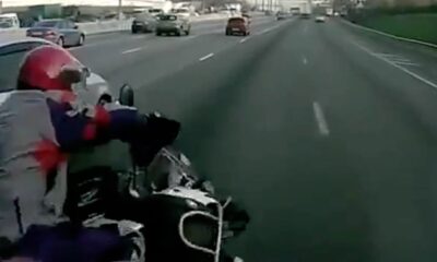 When a careless driver who did not pay attention to the motorcyclist suddenly changed the line, the motorist ran away from the vehicle that changed the line and hit the vehicle on the other line.