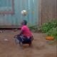 African girl shows her soccer skills with the ball