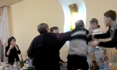 father of the groom fighting with his bride on wedding day because of jealousy